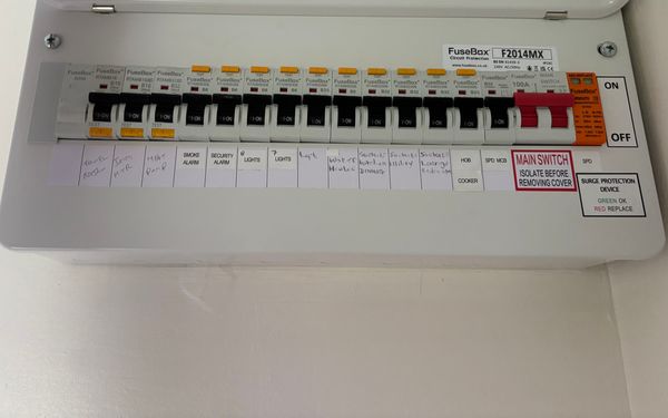 FuseBox F2014MX consumer unit with RCBOs, surge protection and labelled circuits including heat pump and alarms, installed by AK Electrical
