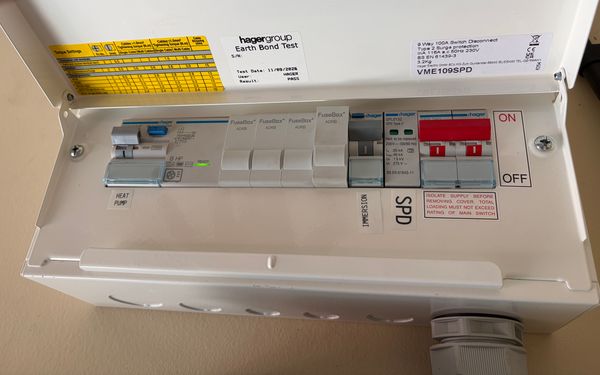Hager VME109SPD enclosure supplying a heat pump and immersion heater, with surge protection, installed by AK Electrical
